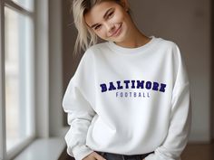 Represent your love for the Baltimore Ravens with this comfy unisex crewneck; or gift it to the Ravens lovers in your life! This cozy sweatshirt is made of medium-heavy fabric. It runs true to size, so size up for a more loose, oversized fit. The collar is ribbed knit, so it will retain its shape even after washing. Plus, no itchy side seams of these sweaters! ~ 50% cotton, 50% polyester ~ Medium-heavy fabric (8.0 oz/yd² (271.25 g/m ~ Loose fit ~ Sewn-in label ~ Runs true to size Pre-shrunk Long Sleeve Sweatshirt, Pre-shrunk Long Sleeve Sweatshirt For Everyday, Everyday Long Sleeve Sweatshirt, Colts Football, Baseball Sweatshirts, Red Crewneck, Football Sweatshirt, Fun Sweatshirts, Baltimore Ravens