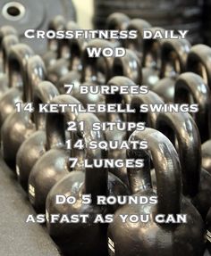 a row of kettles with the words crossfit daily wod on them