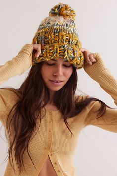 Essential for cold-weather accessorizing, this beanie features a chunky knit fabrication with a folded cuff and oversized pom. **Features:** Chunky knit fabrication, folded cuff, oversized pom detail, slouchy beanie style **Why We ❤ It:** This beanie adds a cozy touch to every look. | Tide Knit Pom Beanie by Free People in Gold Chunky Knit Hat, Beanie Style, Slouchy Beanie, Pom Beanie, Chunky Knit, Hat Fashion, Boho Outfits, Cold Weather, Color Coding