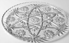 a glass plate with an intricate design on it