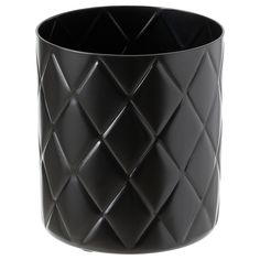 a black vase is shown on a white background