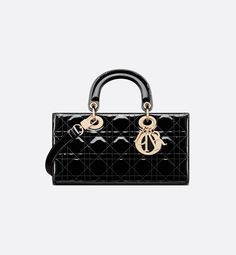 The Lady D-Joy bag captures the House's vision of elegance and beauty by showcasing the iconic streamlined aesthetic of the Lady Dior line. Crafted in black patent calfskin with Cannage stitching, the refined and timeless style is enhanced by pale gold-finish metal D.I.O.R. charms elegantly embellishing its silhouette. Featuring one removable chain strap and another adjustable and removable leather strap, the medium Lady D-Joy bag can be carried by hand, worn over the shoulder or crossbody as a D Joy Bag, Lady D Joy Bag, Lady D, Stylish Celebrities, Small Lady, Christian Dior Couture, Dior Couture, The Lady, Pearl Drop Earrings