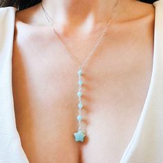 Indulge in the mesmerizing beauty of the Natural star Amazonite lariat pendant necklace. Featuring a string of 4 mm faceted green Amazonite beads and a stunning carved star-shaped Amazonite drop, this necklace is a must-have for any jewelry collection. Whether as a personal accessory or a thoughtful gift, this unique piece will surely captivate and enchant.This Amazonite star pendant necklace comes in two colors: silver or gold. The silver option will come with solid 925 sterling silver cable ch Green Amazonite, Mesmerizing Beauty, Star Pendant Necklace, Fine Jewelry Collection, Star Pendant, Gold Pendant Necklace, Gold Plated Silver, Star Shape, Solid 925 Sterling Silver