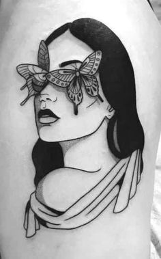 a woman's thigh with a butterfly on her face and the word, i love you