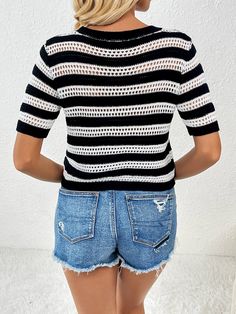 Get ready to turn heads with our Joanna Striped Short Sleeve Top - now available in stunning black white stripe! This playful top features bold stripes and comfortable short sleeves, making it perfect for any occasion. Make a statement and express your unique style with this quirky and fun piece. (And trust us, it's so comfy you won't want to take it off!) Order now and add some fun to your wardrobe! Size Guide: Model is 5’6” tall, and has a 32.4” bust, 24.2”waist, & 35.2” hips. She is wearing a S / US 4 / AU 8. This top is true to size. Material: 100% Acrylic. Key Features: Crew neckline. Short sleeves. Perforated striped. Soft lightweight knit fabric. Relax Fit. Not lined. Care Instructions: Machine wash / Cold hand wash Chic Striped Crew Neck T-shirt, Fitted Black Top With Vertical Stripes, Chic Striped T-shirt For Summer, Chic Striped Short Sleeve T-shirt, Fitted Black Top With Contrast Stripes, Black Fitted Top With Contrast Stripes, Chic Striped T-shirt With Crew Neck, Black Summer T-shirt With Contrast Stripes, Summer Black T-shirt With Contrast Stripes