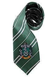 a green harry potter tie with sly crest on it