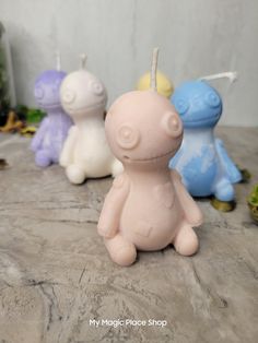 three small candles sitting next to each other on a table