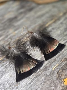 Handmade Turkey Feather Earrings♡ I personally make each pair of earrings with responsibly sourced feathers, utilizing game birds and molting from domesticated birds.    These earrings are lightweight and truly one of a kind.  They make the perfect gift for every woman, huntress, and wild life enthusiast in your life! Thank you for visiting my store! -Miranda Turkey Feathers, Game Birds, Mount Pleasant, Wild Life, Feather Earrings, Jewelry Tutorials, Every Woman, Halloween Shopping, Jewelry Earrings Dangle