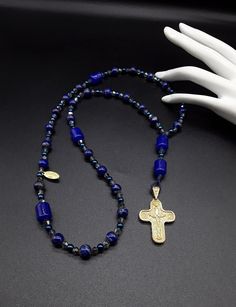 Blue Cross Spiritual Necklace, Spiritual Blue Cross Pendant Necklace, Blue Crucifix Necklace For Spiritual Wear, Blue Crucifix Necklace For Spiritual Purposes, Blue Cross Spiritual Jewelry, Blue Spiritual Cross Jewelry, Blue Spiritual Rosary With Gemstone Beads, Spiritual Blue Rosary With Gemstone Beads, Spiritual Crucifix Gemstone Jewelry