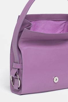 Our bestseller, the SHOULDER BAG in soothing lavender, may potentially become your beloved accessory of this season. 
This bag is ideal for an everyday occasion, with enough room for all your essentials. Luxury Purple Shoulder Bag For On-the-go, Modern Purple Bag With Detachable Strap, Luxury Purple Bags For Everyday Use, Luxury Everyday Purple Bags, Modern Purple Travel Bags, Lavender Shoulder Bag With Adjustable Strap For Travel, Luxury Purple Shoulder Bag With Removable Pouch, Lavender Tote Bag For Travel, Purple Tote Shoulder Bag With Dust Bag