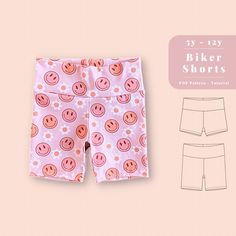 the shorts are designed to look like smiley faces and pink polka dot dots on them