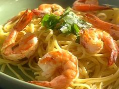 pasta with shrimp and parsley in a bowl