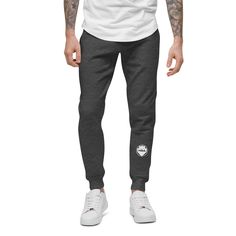 Well-made and lined with fleece, these comfortable Unisex Fleece Sweatpants will be your first choice for a casual everyday outfit—all you need to add is a graphic tee and sneakers to finish off the look. • 100% cotton face • 65% cotton, 35% polyester • Charcoal Heather is 55% cotton, 45% polyester • Tightly knit 3-end fleece • 5-thread stitching • Cuffed and side-seamed legs • Elastic inside the waistband • Flat drawstrings in a matching color • 2 cross pockets in front • 1 top-stitched patch p White Joggers, Clothing Logo, Branded Sweatshirts