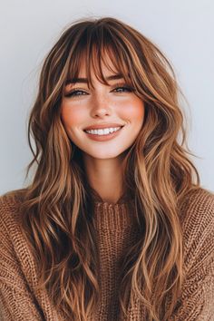 Click for More ➡️ | Save for Later ❤️  This bronze hair color radiates warmth and shine, with curtain bangs that are layered to add extra dimension around the face. The long layers are curled at the ends for a polished, put-together appearance. (Bronze Glow with Layered Curtain Bangs - Long Layered Hair With Bangs) Long Layered Fringe Hairstyles, Curtain Bangs Long Hair Brunette Balayage, Across Bangs Long Hair, Bangs And Layered Hair Medium, Medium Length Hair Bangs Layers, Layered Fluffy Hair With Bangs, Hair Ideas For Brunettes With Bangs, Fall Hair Cuts For Round Faces, Highlights With Bangs Face Framing