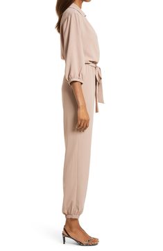 The jumpsuit trend is, well, hopping, and this option, styled with an easy tied waist and elastic cuffs, is a winning way to wear the look. Style Name:Fraiche By J Tie Waist Long Sleeve Jumpsuit. Style Number: 6177668. Beige Jumpsuit, Jumpsuit Style, Long Sleeve Jumpsuit, Tie Belt, Tapered Legs, Women's Clothing, Jumpsuit, Nordstrom, Size Medium