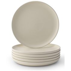 white plates stacked on top of each other