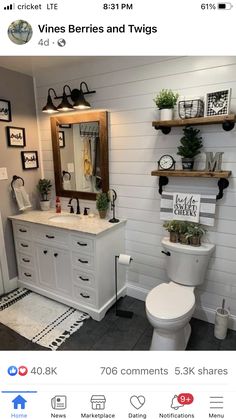 the bathroom is decorated in white and black