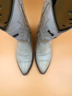 "White men's cowboy boots, made from real leather, vintage style, embroidered with unique pattern, western style, fashionable streetstyle boots, cowboy boots, white color, has size 9 Description: - Sharp socks - Embroidered decorative stitching in beige colors - The original embroidery on boots - On the both sides there are unique pattern - Leather inside and outside - No zippers and buckles - Delicate genuine vintage leather - Tabs on both sides of the boot shaft - Cowboy heel Condition: - Qual White Pointed Toe Boots For Western-themed Events, White Leather Boots For Western-themed Events, White Western Boots For Western-themed Events, Western Cream Boots For Ranch, Western Cream Ankle Boots, Western Style Cream Ankle Boots, Cream Snip Toe Boots For Rodeo, Western Style White Ankle Boots, White Country Boots For Ranch