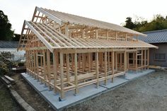 a house being built with wooden framing