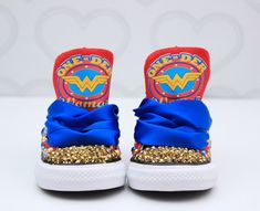 How adorable are these Wonder woman inspired converse! The perfect shoe to complete the look! Please leave your name needed in the notebox during checkout Visit the tutu section or search bar for the matching outfit! If you are unsure of sizing please scroll to the last photos for our size charts, or visit our size charts here--> https://pinktoesnhairbows.com/pages/size-chart All sales are FINAL, Ship dates can be found directly on the listing, please view our policies in detail here---> https:/ Wonder Woman Shoes, Overalls Boys, Tutu Dress Costumes, Bling Converse, Girls Overalls, Girls Converse, Matching Outfit, Birthday Tutu, Search Bar