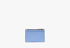 Like the bag of the same name our Knott zip cardholder has multiple slots and pockets to organize all your cards and cash. It's the wallet that ties it all together. | Kate Spade Knott Colorblocked Zip Card Holder, Genie Blue Kate Spade Rectangular Card Holder With Card Slots, Kate Spade Blue Wallet With Card Slots, Kate Spade Blue Rectangular Wallet, Kate Spade Blue Travel Wallet, Kate Spade Knott, Trim Styles, Smooth Leather, Leather Trims, Slots