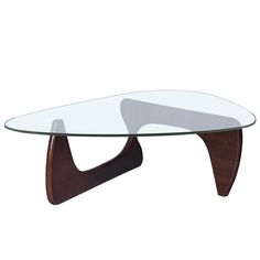 an oval glass table with wooden legs and a curved base, on a white background