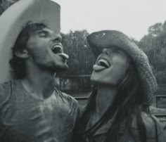 black and white photograph of two people laughing