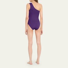 Eres "Effigie" solid one-piece swimsuit. One-shoulder neckline. High-cut legs. Moderate seat coverage. Nylon/spandex. Made in Italy. Stretch Bodysuit With Asymmetrical Neckline And Lined Body, Fitted One-shoulder Swimsuit For Pool, One-shoulder Stretch Solid Swimwear, Fitted One-shoulder One-piece For Pool, Fitted One-shoulder One Piece For Pool, One Shoulder Lined Body Swimwear, One-shoulder Lined Swimwear, Solid Asymmetrical Neckline Swimwear With Stretch, Beachwear Swimwear With Asymmetrical Neckline