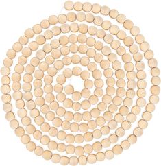 wooden beads are arranged on a white surface