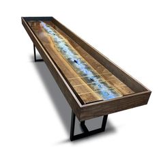 a long table with water running down it's sides and blue lights on the top