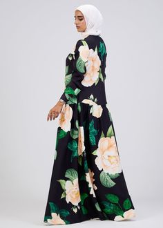 Elevate your wardrobe with this stunning floral print button-front maxi dress, crafted from durable crepe fabric for long-lasting comfort and elegance. The soft black base is adorned with a vibrant floral pattern, making it a standout piece for any occasion. Designed with a modest fit, this dress features a belted waist and tiered skirt, providing a flattering silhouette that flows gracefully with every movement. The button-front design adds a touch of sophistication, while the long sleeves ensu Black Printed Maxi Dress, Black Modest Floor-length Maxi Dress, Modest Black Floor-length Maxi Dress, Black Floral Print Floor-length Maxi Dress, Modest Black Floral Print Maxi Dress, Modest Black Maxi Dress With Floral Print, Black Floral Print Maxi Dress, Button Front Maxi Dress, Modest Fits