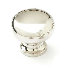 a silver knob on a white background