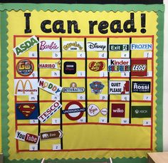 a bulletin board that has some stickers on it with words and pictures attached to it