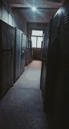 an empty room with several lockers in it