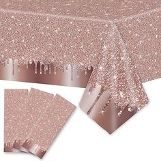 a table cloth with pink glitter on it