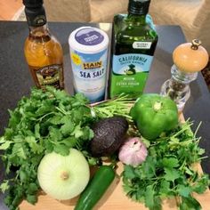 an assortment of vegetables on a cutting board