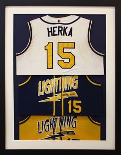 a framed jersey with the number 15 and lightning's name is displayed in front of it