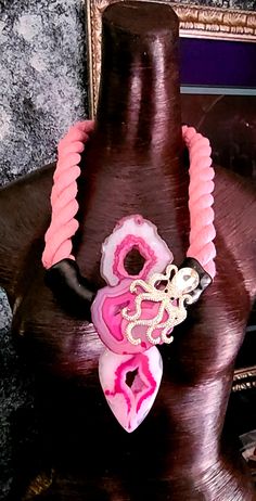 OOAK Artisan Hot Pink - Fuchsia - Fuschia Druzy Agate and Rhinestone Octopus Hand Sculpted Chest Piece. Features three luxury druzy agates arranged as a totem with a Diamante Octopus Jeweled Accent set in a metal alloy. Pendant is affixed to a thick light pink or dusty rose cotton rope via a proprietary sculpted material which is painted a glossy black then sealed with a high gloss glaze. Please note that monitors will display color differentially. The pendant portion measures 7" x 3" (not inclu Artistic Pink Jewelry For Party, Artistic Pink Party Jewelry, Luxury Handmade Pink Necklace, Luxury Handmade Pink Jewelry, Rocker Chic Accessories, Sculpting Materials, Unique Pendant Necklace, Statement Bib Necklace, Chest Piece