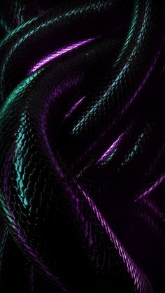 purple and green snake skin textured together in an abstract pattern on a black background