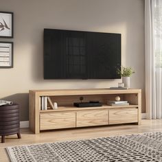 a flat screen tv mounted to the side of a wooden entertainment center in a living room