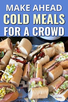 a pile of sandwiches with the words make ahead cold meals for a crowd on it