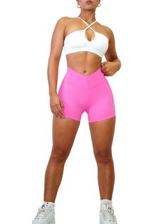 Description: Stay trendy and comfortable with these Low Back V Pocket Scrunch Shorts. Crafted with a flattering V-back and pockets along with a subtle scrunch, these sexy yet elegant shorts are sure to be your favorite. All of our leggings are made out of high quality nylon and spandex. Expect VERY comfortable, soft, and breathable fabric on your skin. Unlike cheap polyester leggings, these leggings do not slide down as you move and instead forms your figure all day. From shopping, working, goin Elegant Shorts, Scrunch Shorts, Favorite Leggings, White Sports Bra, Back Pocket, Sports Bras, Low Back, Neon Pink, Making Out