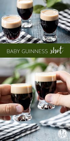 two hands holding glasses filled with liquid and the words baby guinness shot in front of them