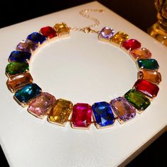 Material: glass crystal Material: Alloy Size: 41.2+12.3cm. The main length of this necklace is 41.2cm. The adjustable extension chain length is 12.3cm Trendy Crystal Necklaces With Jewels, Trendy Multicolor Glass Necklaces, Trendy Multicolor Glass Necklace, Multicolor Crystal Choker Jewelry, Multicolor Jeweled Choker Necklace, Multicolor Clavicle Chain Necklace For Party, Trendy Rainbow Necklace For Parties, Elegant Multicolor Crystal Necklace With Adjustable Chain, Multicolor Crystal Necklaces For Parties