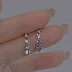 Elegant Vintage Teardrop Earrings With Blue Rhinestones, Retro Style Silver. Silver And Blue Earrings, Silver Rhinestone Teardrop Earrings For Gift, Silver Teardrop Earrings With Rhinestones For Gift, Silver Teardrop Earrings With Sparkling Stones, Silver Teardrop Earrings With Rhinestones, Blue Rhinestones, Blue Earrings, Teardrop Earrings, Blue And Silver