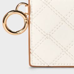 This Large Zip Card Case from A New Day™ in off-white is decorated with a diamond-stitched design for a fashionable, on-trend look. It includes interior and exterior credit card pockets and closes with a zipper to help keep your items nicely contained. Plus, it features an attached ring for connecting to your bag, backpack or keys. A New Day™: Style that goes wherever you do. White Rfid Blocking Card Holder For Daily Use, Cream Rectangular Wallets With Card Slots, White Card Holder With Interior Slots For Everyday Use, White Rfid Blocking Wallets For Everyday, White Rectangular Coin Purse For Daily Use, White Card Holder With Interior Slots, Travel Wallet With Card Slots In Cream Color, White Rfid Blocking Wallets, Cream Travel Wallet With Card Slots