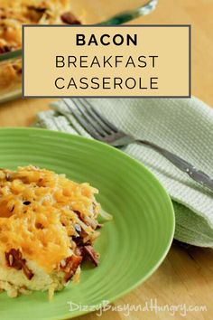 bacon breakfast casserole on a green plate with a fork and napkin in the background