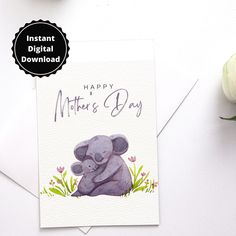 a mother's day card with an elephant on it and flowers in the background