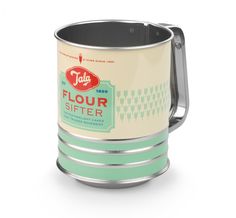 a green and white tin can with the word flour sifter printed on it