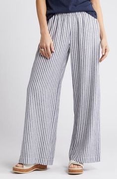 Breezy stripes adorn these lightweight linen-blend pants cut with flowy wide legs and topped with a comfortable elastic waist. 31" inseam; 25" leg opening; 11 1/2" front rise; 15" back rise (size Medium) Elastic waist Front slant pockets; back welt pockets 55% linen, 45% rayon Machine wash, tumble dry Imported Striped Linen Pants Outfit, Pants Nordstrom, Linen Pants Outfit, Striped Linen Pants, Workwear Jeans, White Linen Pants, Linen Blend Pants, Summer Staples, Wide Legs